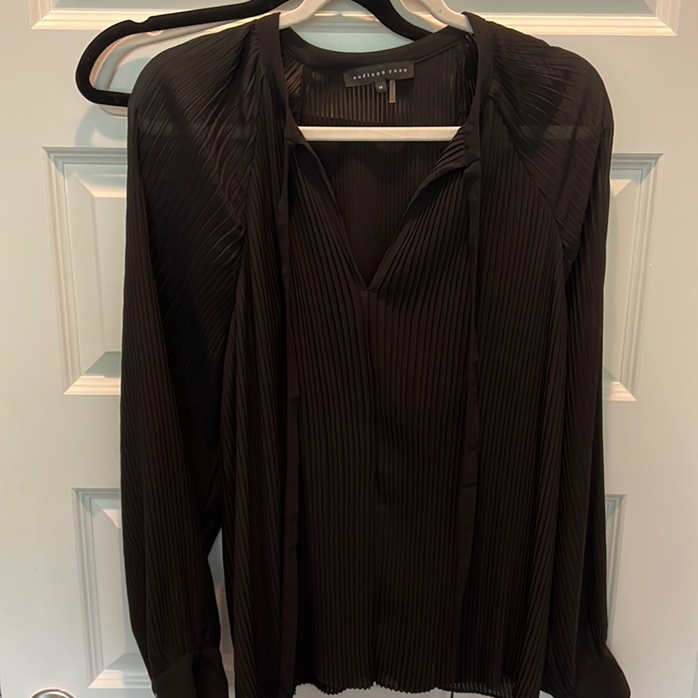 Black pleated blouse